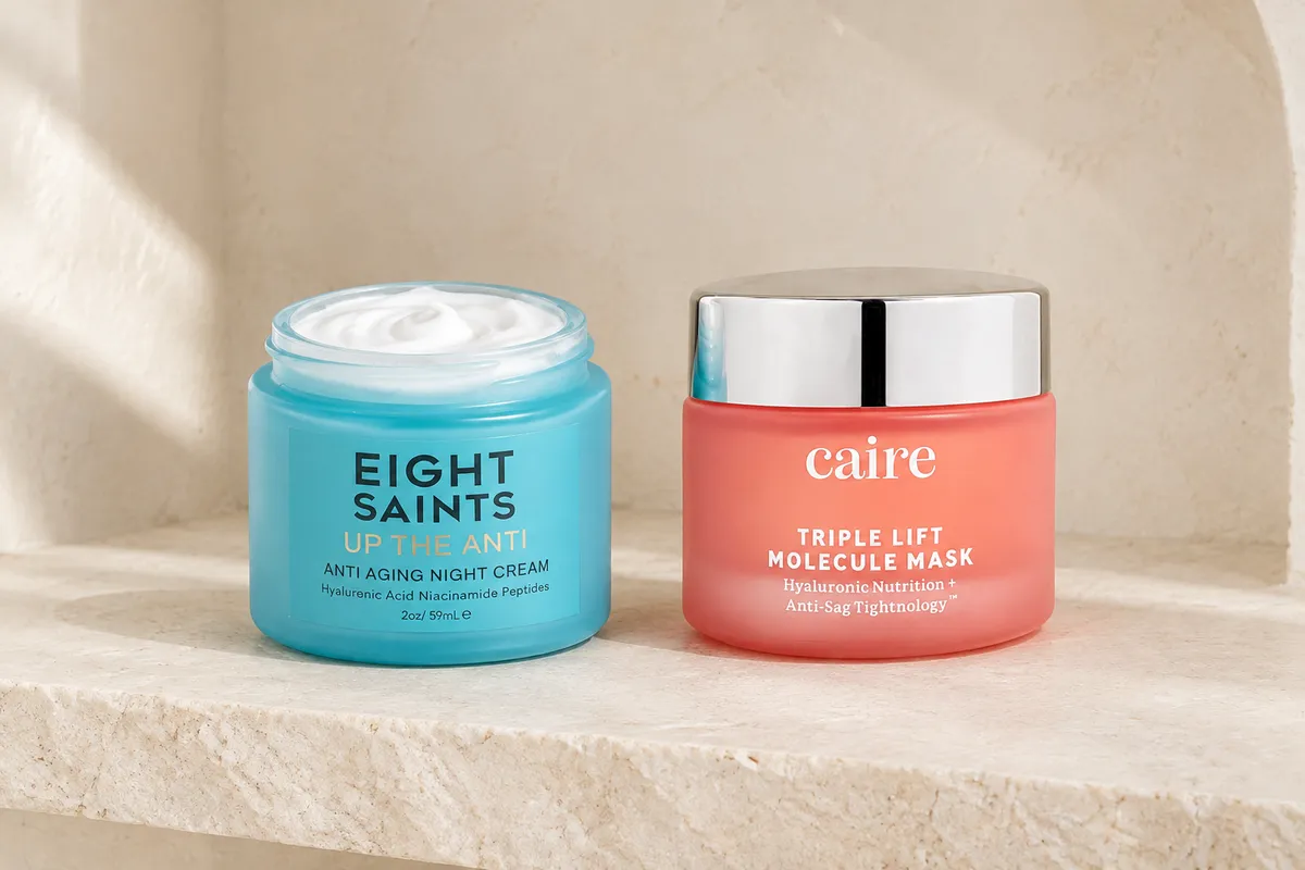 Eight Saints Up The Anti Night Cream and Caire Triple Lift Molecule Mask, 2 oz and 40 ml, on a bathroom shelf (illustrative AI-generated scene)