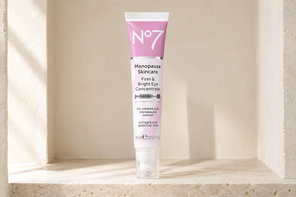 No7 Menopause Skincare Firm & Bright Eye Concentrate, 0.5 fl oz, on a bathroom shelf (illustrative AI-generated scene)